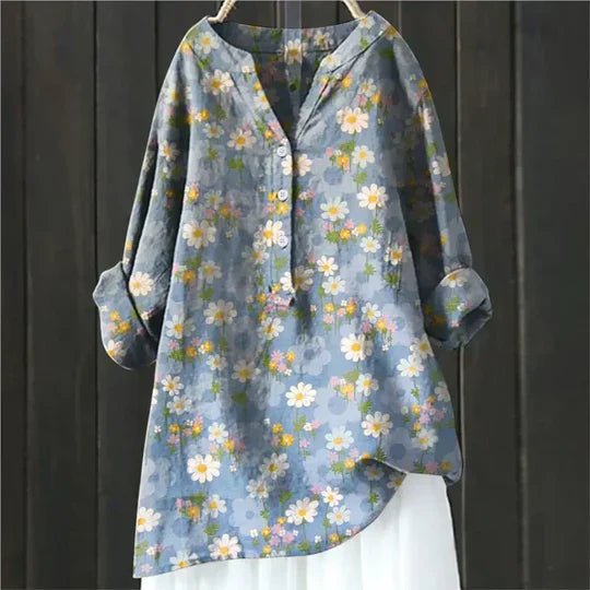 Women’s floral tunic top with button-up front, long sleeves, and relaxed fit, suitable for casual outings, travel, and everyday wear.