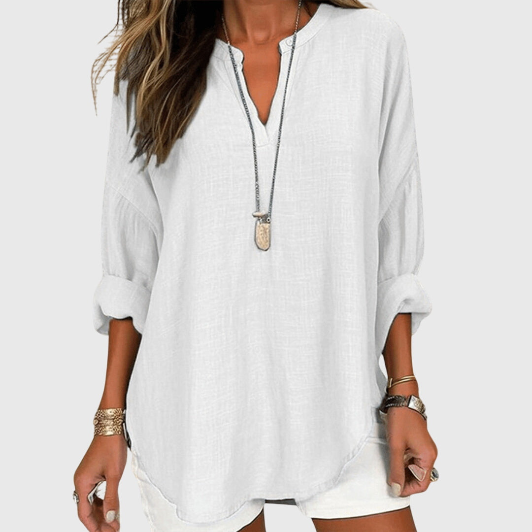 Women’s flowy beach shirt with round neck and long sleeves, ideal for beach vacations, casual summer outfits, and lightweight layering.