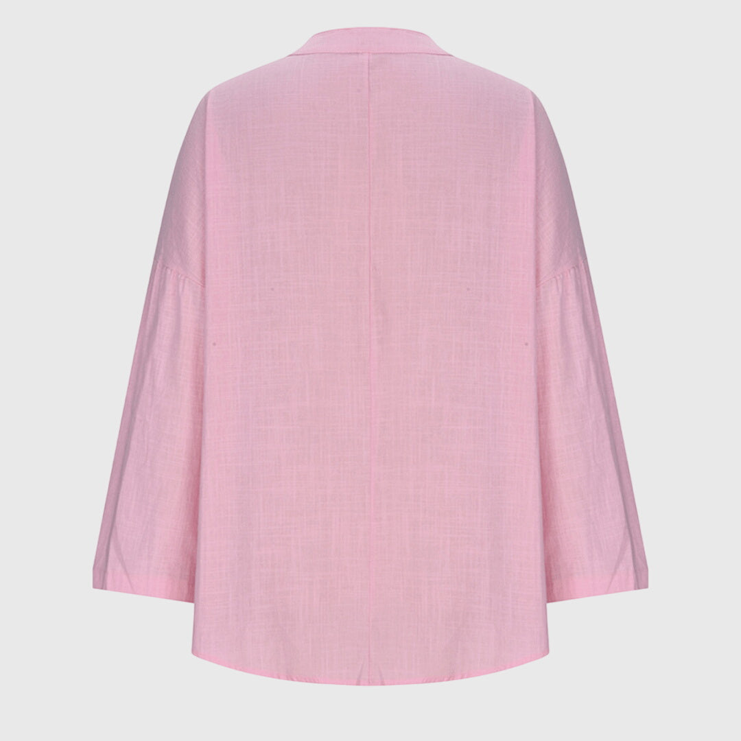 Women’s flowy beach shirt with round neck and long sleeves, ideal for beach vacations, casual summer outfits, and lightweight layering.
