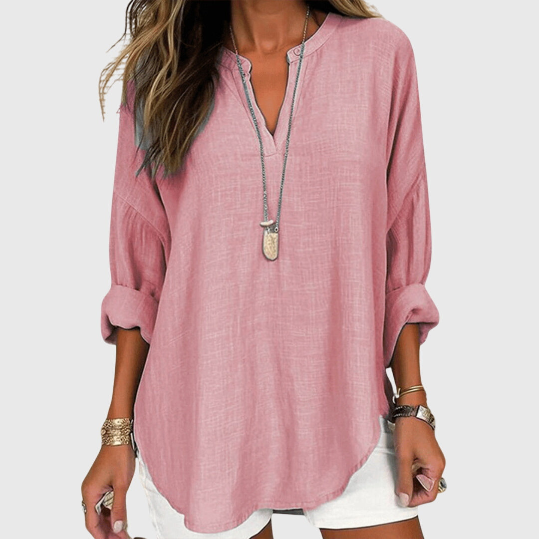 Women’s flowy beach shirt with round neck and long sleeves, ideal for beach vacations, casual summer outfits, and lightweight layering.