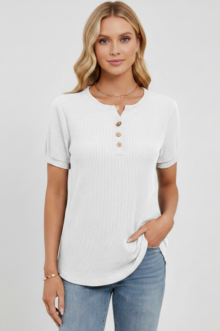Women’s henley T-shirt with V-neckline, button placket, and ribbed texture, designed for everyday wear and casual outfits.