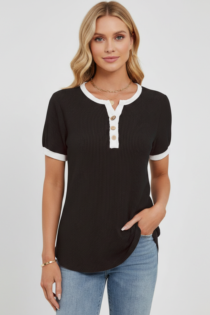 Women’s henley T-shirt with V-neckline, button placket, and ribbed texture, designed for everyday wear and casual outfits.