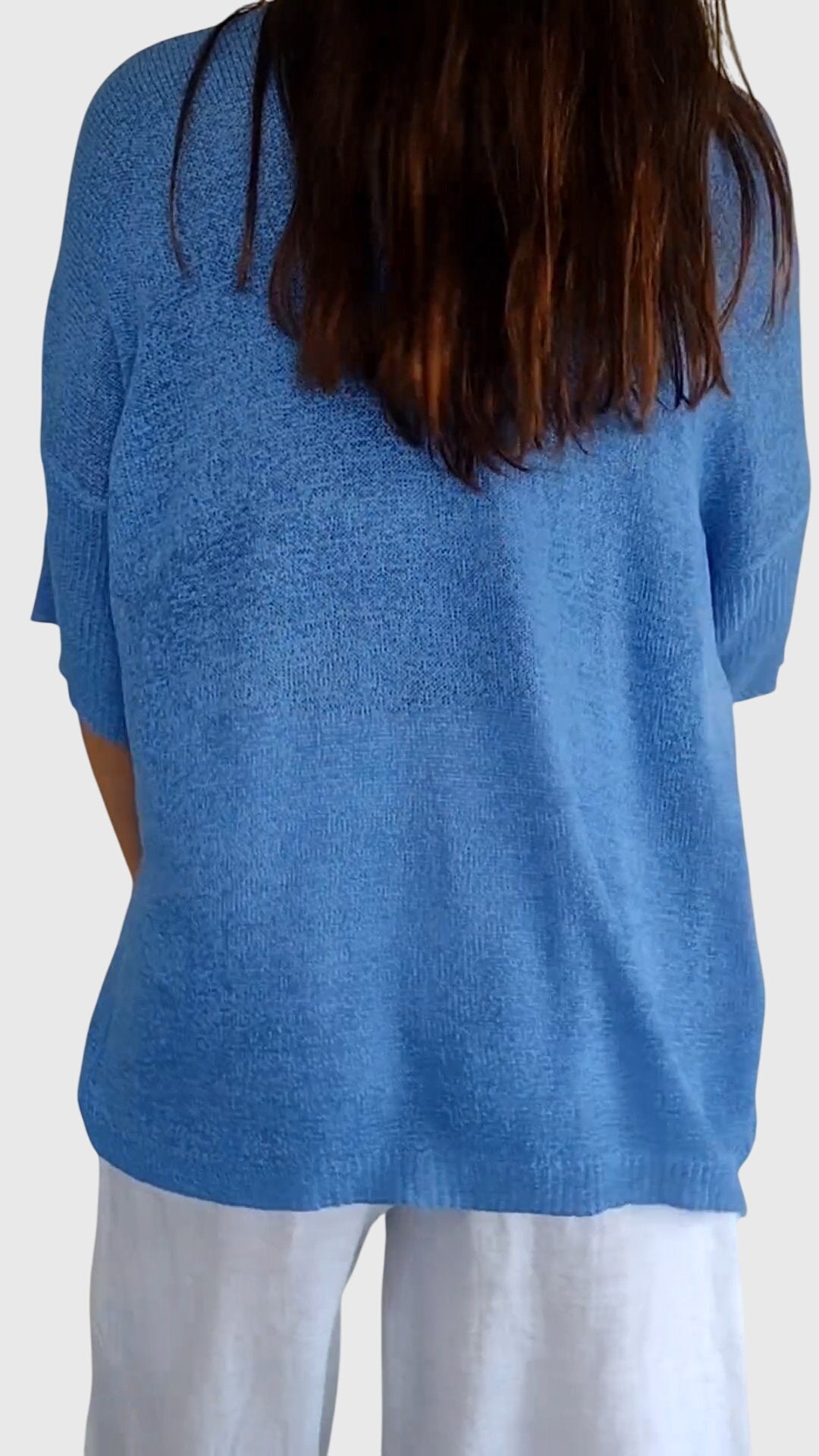 Women’s knit top with V-neckline and soft fit, ideal for layering, casual outfits, office wear, and everyday styling.