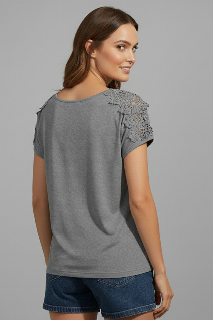 Women’s T-shirt with round neckline and lace shoulder trim, designed for everyday wear and casual outfits.
