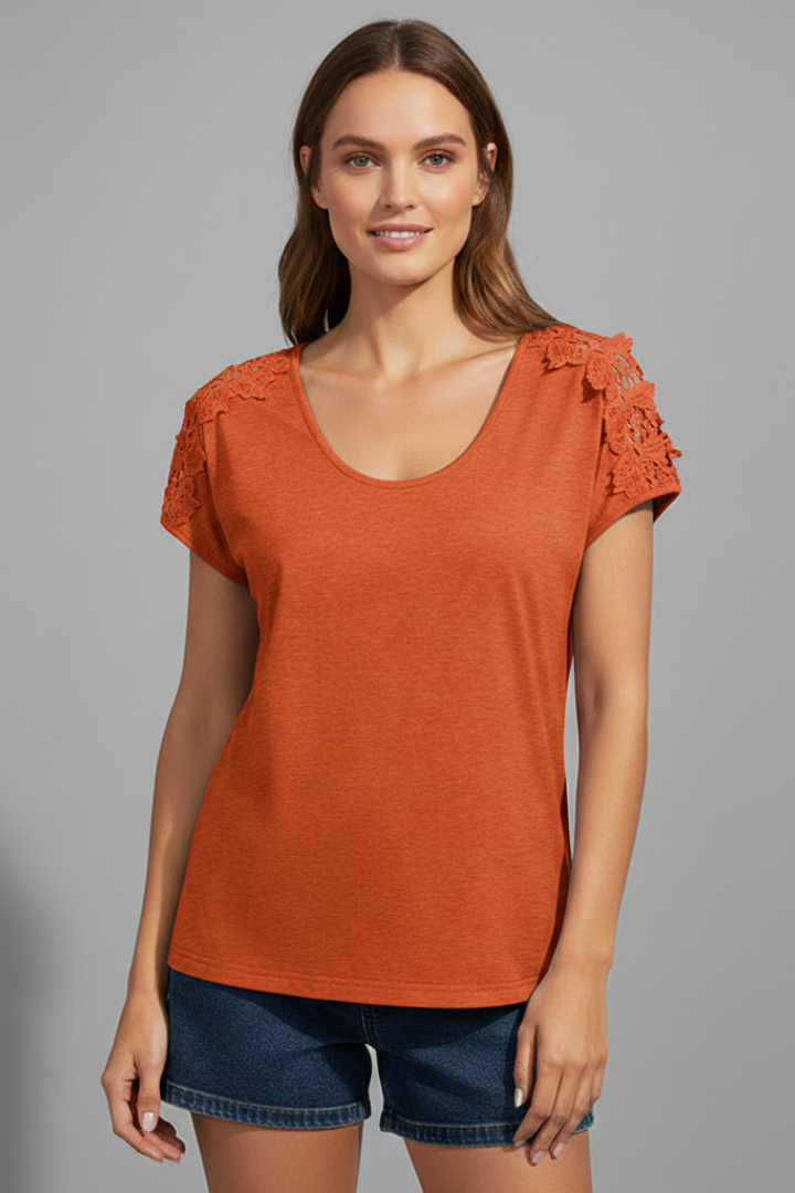 Women’s T-shirt with round neckline and lace shoulder trim, designed for everyday wear and casual outfits.
