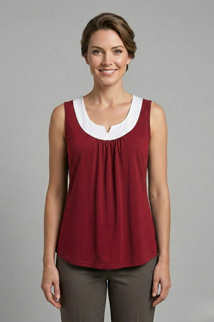 Women’s sleeveless tank top with layered V-neckline, wide straps, and rounded hem, suitable for casual wear and everyday layering.