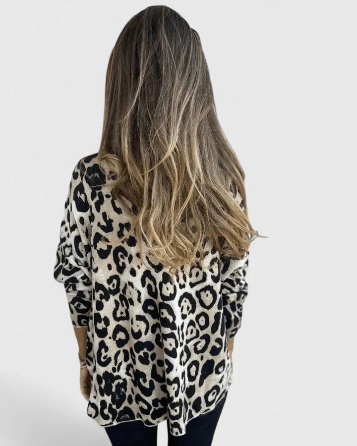 Women’s leopard print top with a relaxed fit and timeless design, ideal for everyday wear, casual outings, travel, and weekend styling.