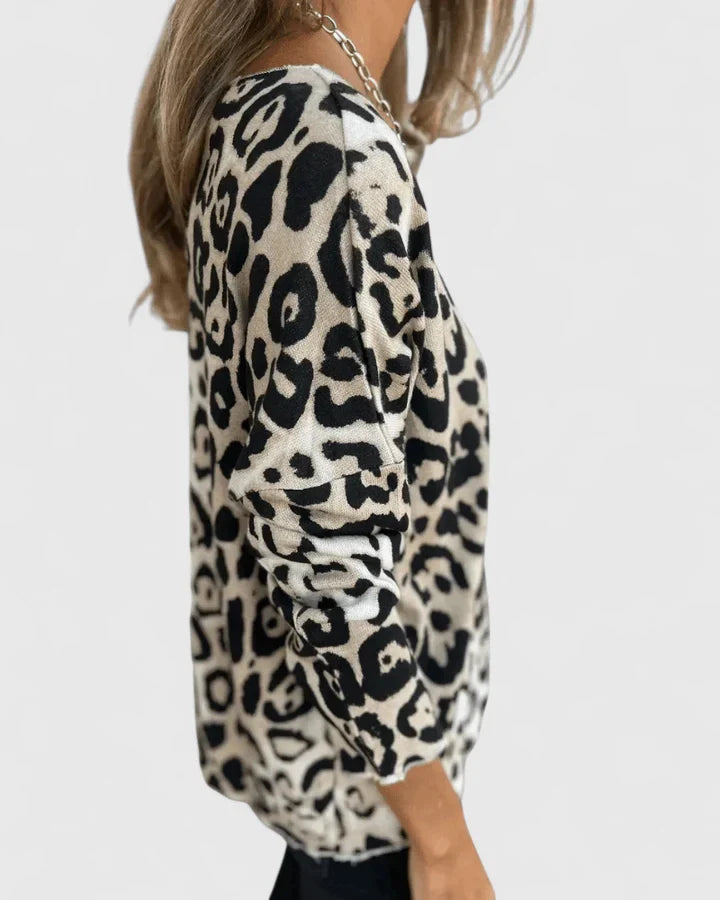 Women’s leopard print top with a relaxed fit and timeless design, ideal for everyday wear, casual outings, travel, and weekend styling.