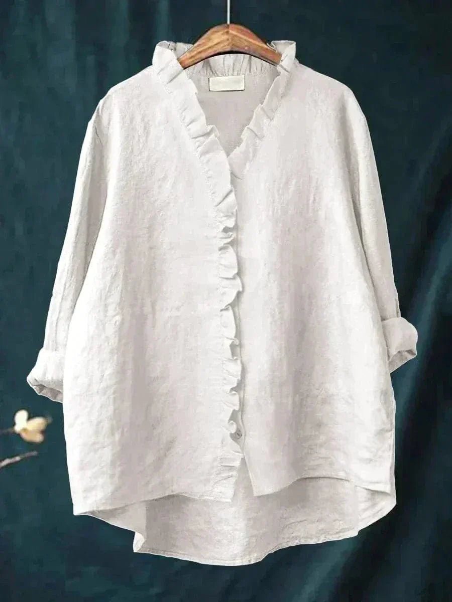 Women’s linen blouse with ruffle neckline and relaxed fit, suitable for summer wear, office outfits, and casual occasions.