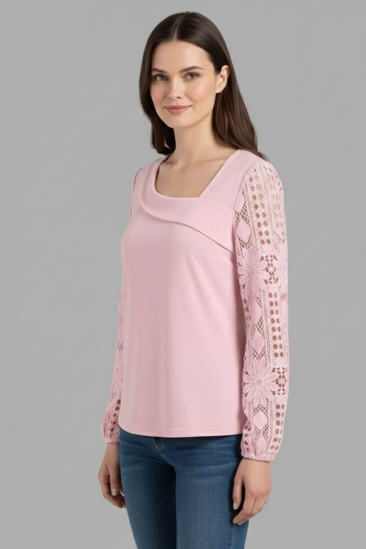 Women’s long sleeve blouse with lace sleeves and cut out detailing, featuring a round neckline and straight hem for office or evening wear.