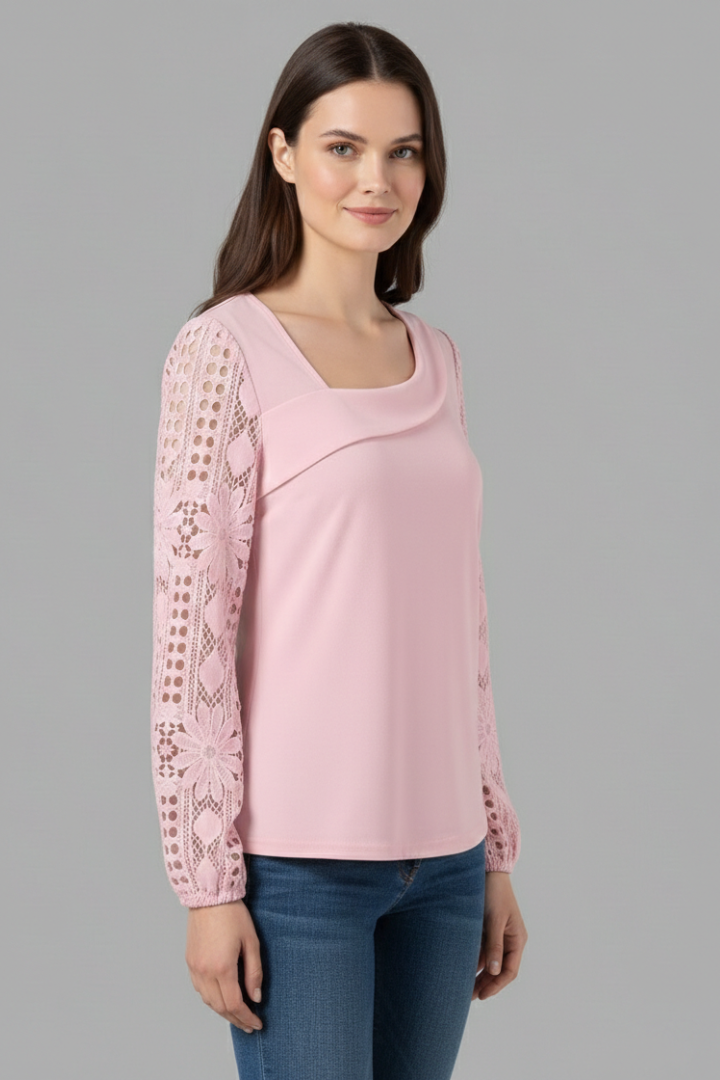 Women’s long sleeve blouse with lace sleeves and cut out detailing, featuring a round neckline and straight hem for office or evening wear.
