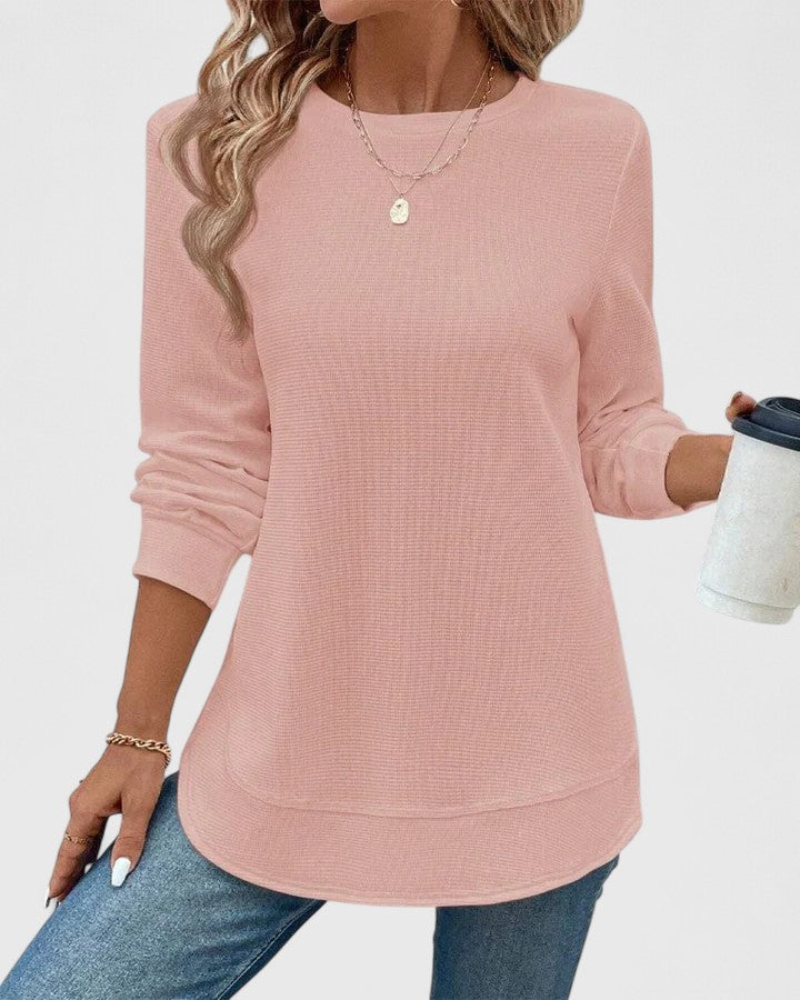 Women’s long sleeve top with an O-neck neckline and relaxed fit, ideal for casual wear, seasonal layering, and everyday styling.