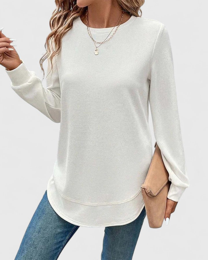 Women’s long sleeve top with an O-neck neckline and relaxed fit, ideal for casual wear, seasonal layering, and everyday styling.