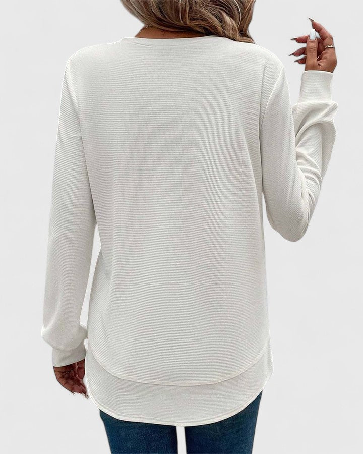 Women’s long sleeve top with an O-neck neckline and relaxed fit, ideal for casual wear, seasonal layering, and everyday styling.