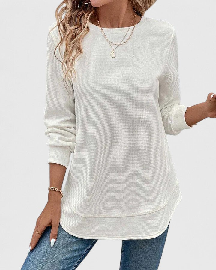 Women’s long sleeve top with an O-neck neckline and relaxed fit, ideal for casual wear, seasonal layering, and everyday styling.