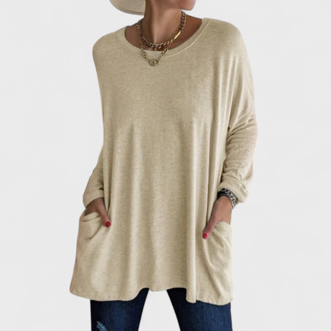 Women’s long sleeve top with a relaxed fit and flattering drape, ideal for everyday wear, layering, casual outings, and versatile styling.