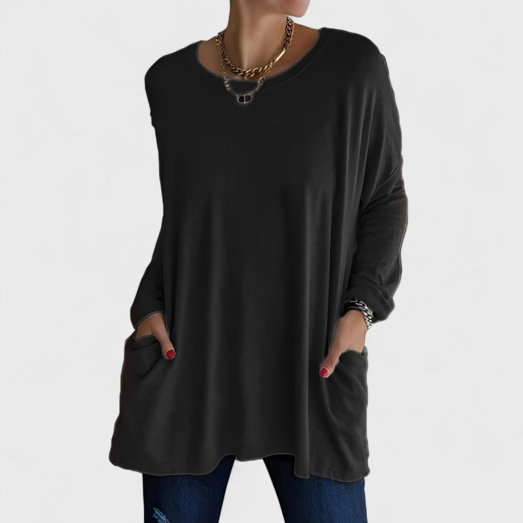 Women’s long sleeve top with a relaxed fit and flattering drape, ideal for everyday wear, layering, casual outings, and versatile styling.