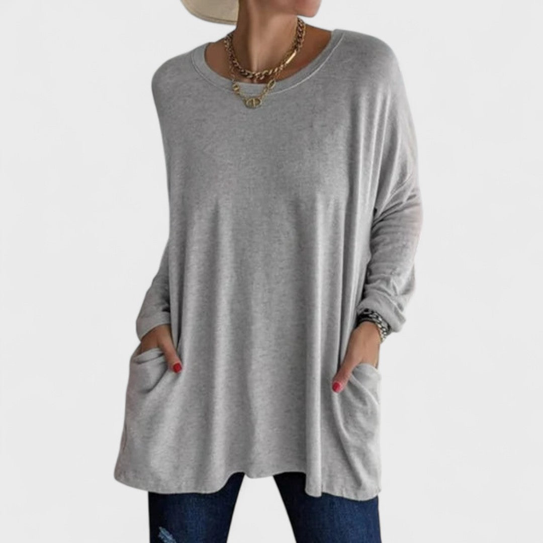 Women’s long sleeve top with a relaxed fit and flattering drape, ideal for everyday wear, layering, casual outings, and versatile styling.