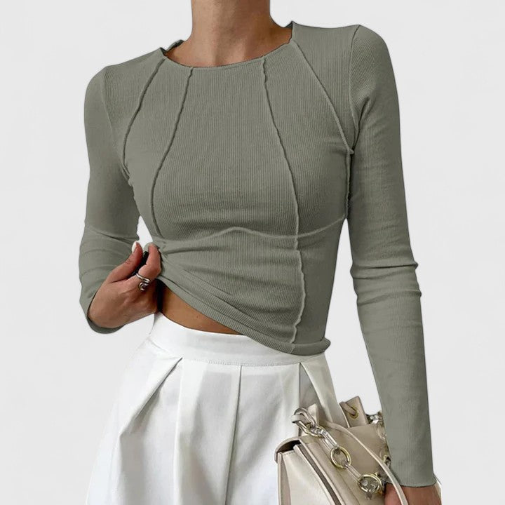 Women’s long sleeve top with a sculpted fit and timeless design, ideal for everyday wear, office outfits, and casual occasions.