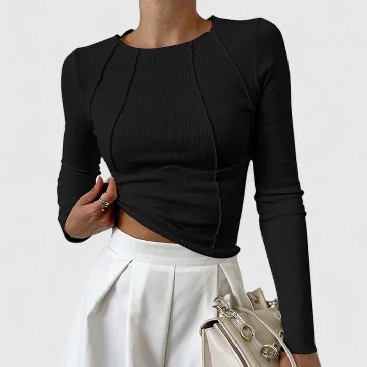 Women’s long sleeve top with a sculpted fit and timeless design, ideal for everyday wear, office outfits, and casual occasions.
