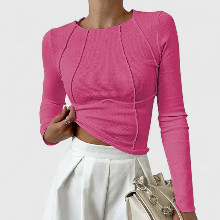 Women’s long sleeve top with a sculpted fit and timeless design, ideal for everyday wear, office outfits, and casual occasions.