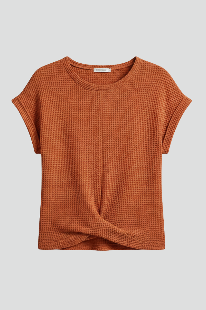 Women’s loose-fit T-shirt with boat neckline and textured finish, designed for everyday comfort and casual styling.