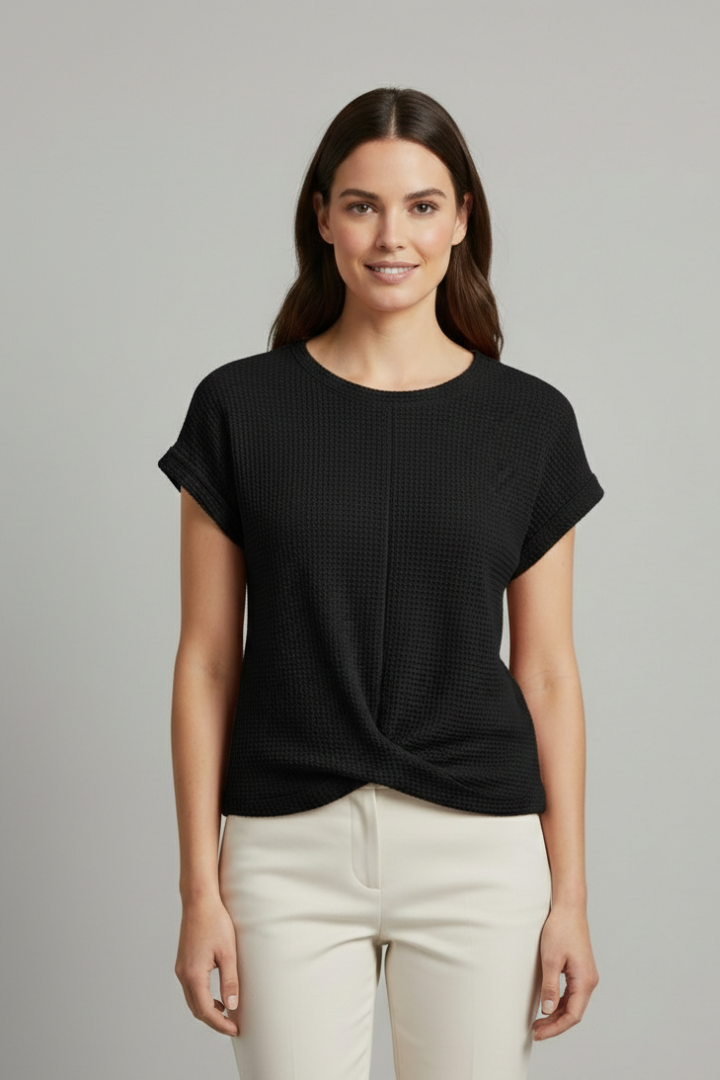 Women’s loose-fit T-shirt with boat neckline and textured finish, designed for everyday comfort and casual styling.