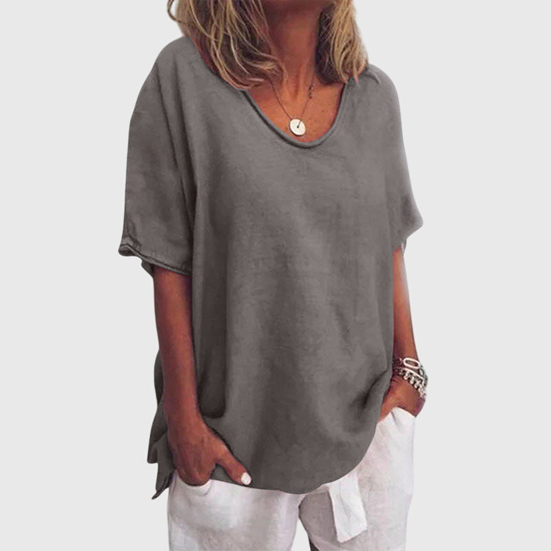 Women’s loose top with a relaxed fit and flowy silhouette, ideal for everyday wear, casual outings, and smart-casual styling.