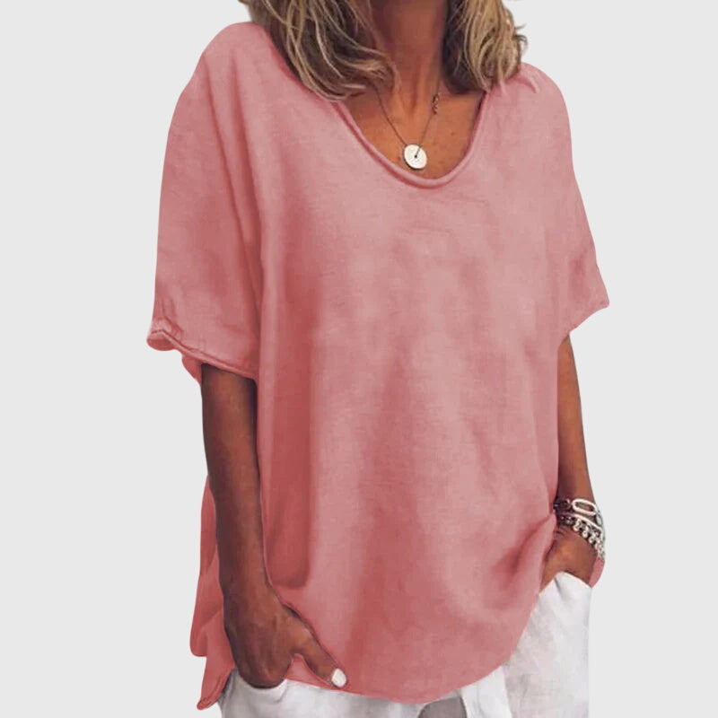 Women’s loose top with a relaxed fit and flowy silhouette, ideal for everyday wear, casual outings, and smart-casual styling.