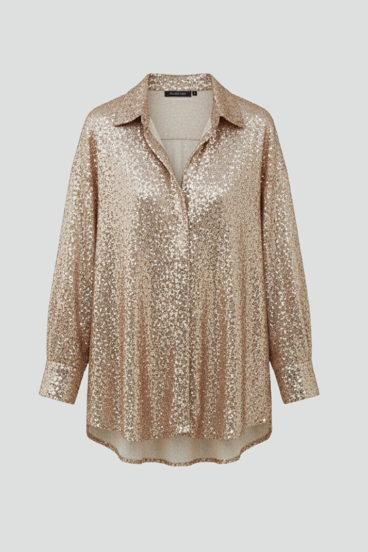 Women’s oversized blouse with shimmering design and long sleeves, suitable for evening wear and special occasions