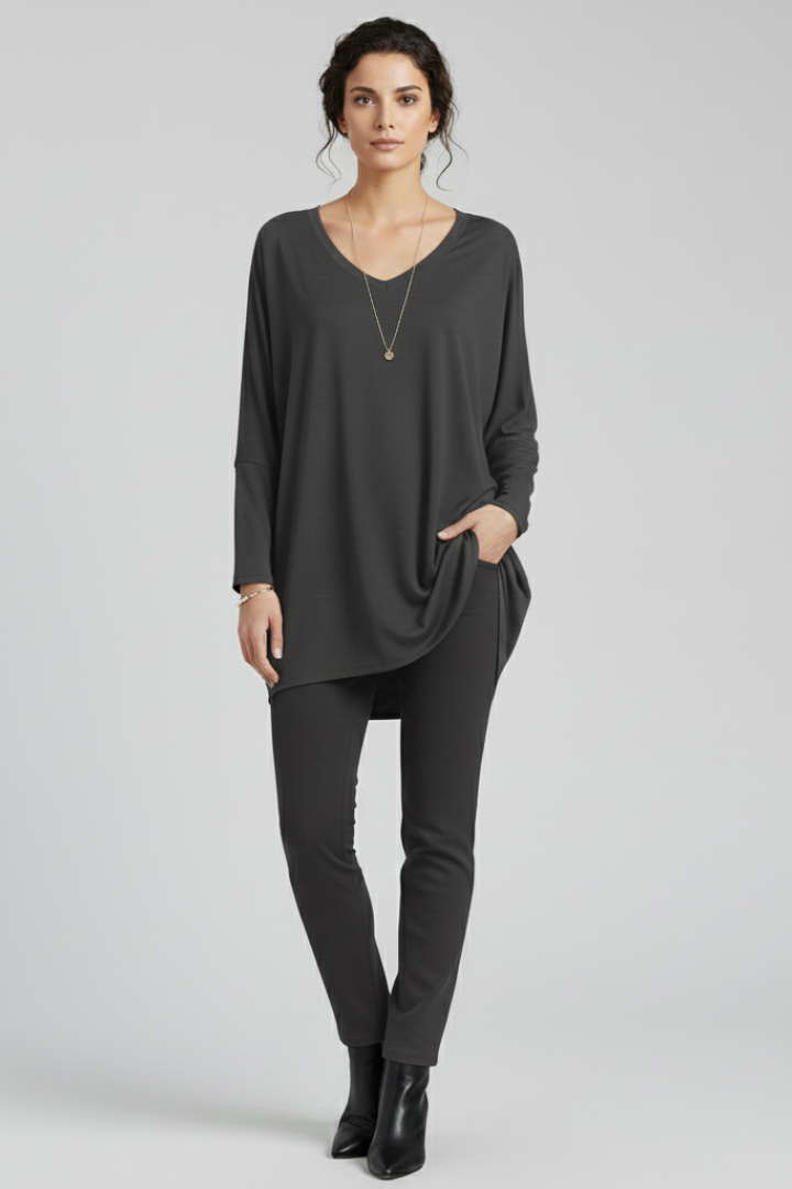 Women’s oversized V-neck shirt with long sleeves, designed for casual wear and versatile everyday outfits