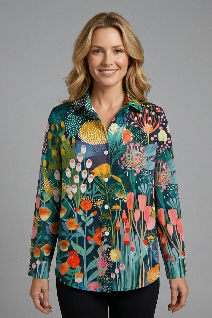 Women’s patterned blouse with button front, long sleeves, and straight fit, ideal for casual outfits and office styling.