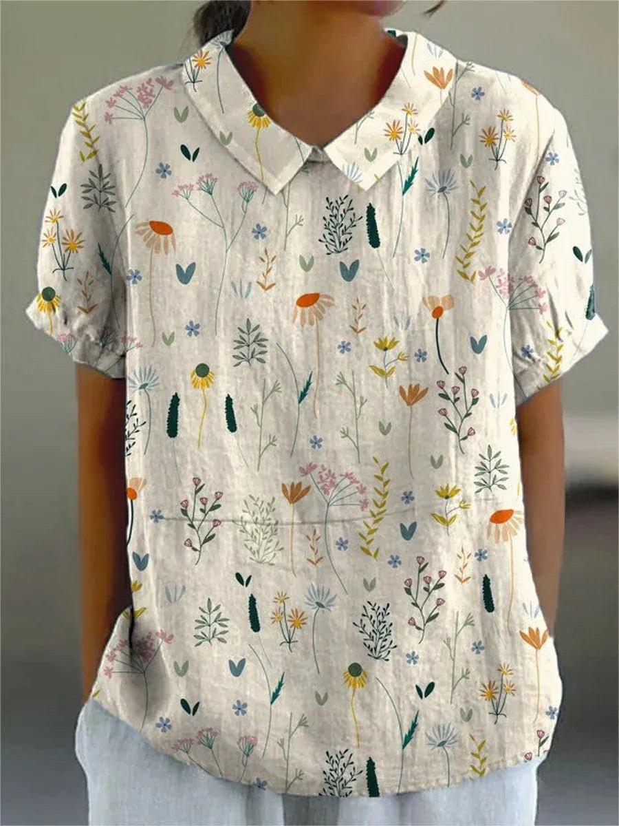 Women’s polo shirt with floral print, relaxed fit, and short sleeves, ideal for everyday wear, casual outings, and seasonal styling.