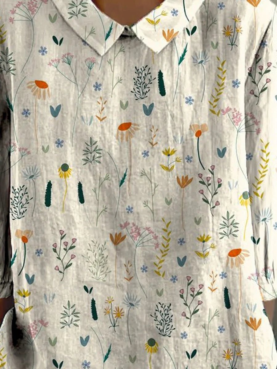 Women’s polo shirt with floral print, relaxed fit, and short sleeves, ideal for everyday wear, casual outings, and seasonal styling.