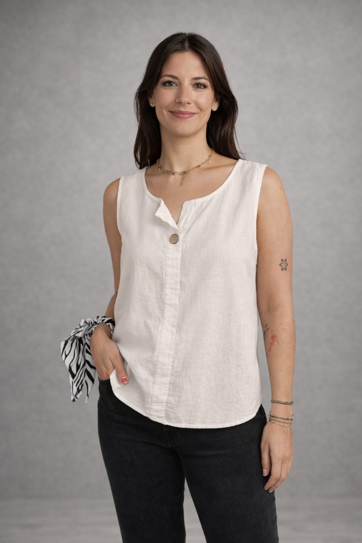 Women’s sleeveless blouse with round neckline and front button detail, suitable for casual wear and office outfits