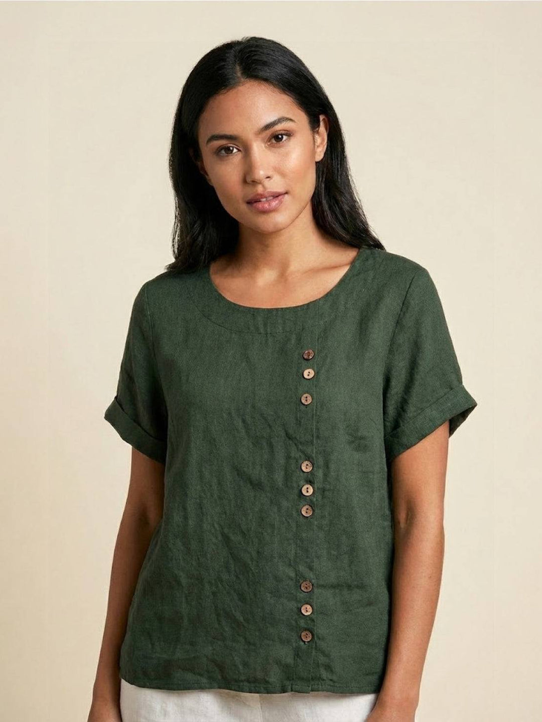 Women’s round neck blouse with button detailing and a relaxed fit, suitable for summer outfits, casual wear, and everyday styling.
