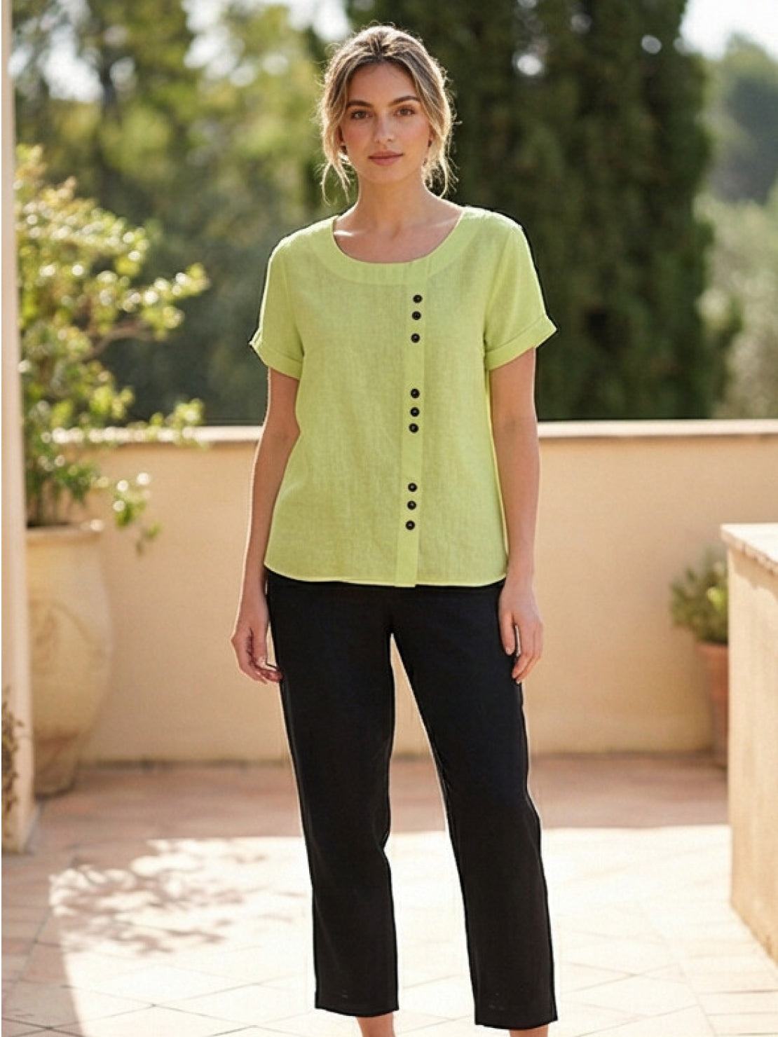 Women’s round neck blouse with button detailing and a relaxed fit, suitable for summer outfits, casual wear, and everyday styling.