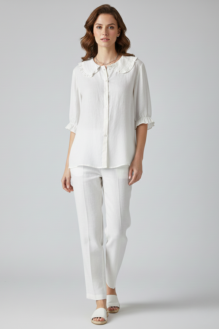 Women’s shirt with ruffled collar, button-front closure, and relaxed fit, suitable for office casual wear, summer outings, and everyday styling.