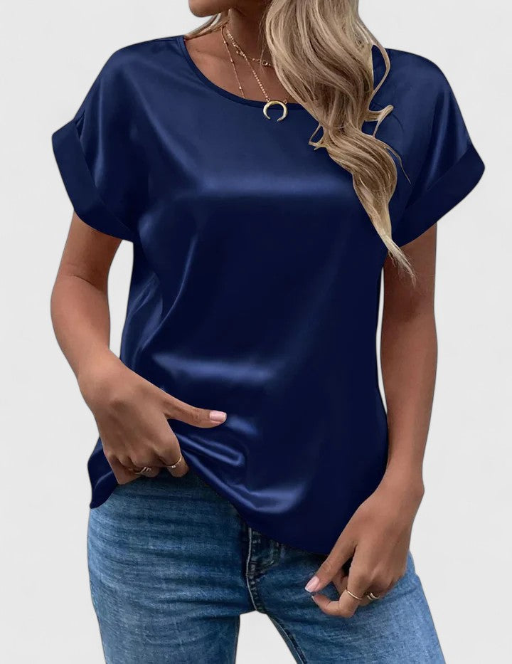 Women’s satin blouse with batwing sleeves and a relaxed fit, suitable for office outfits, casual wear, and evening styling.