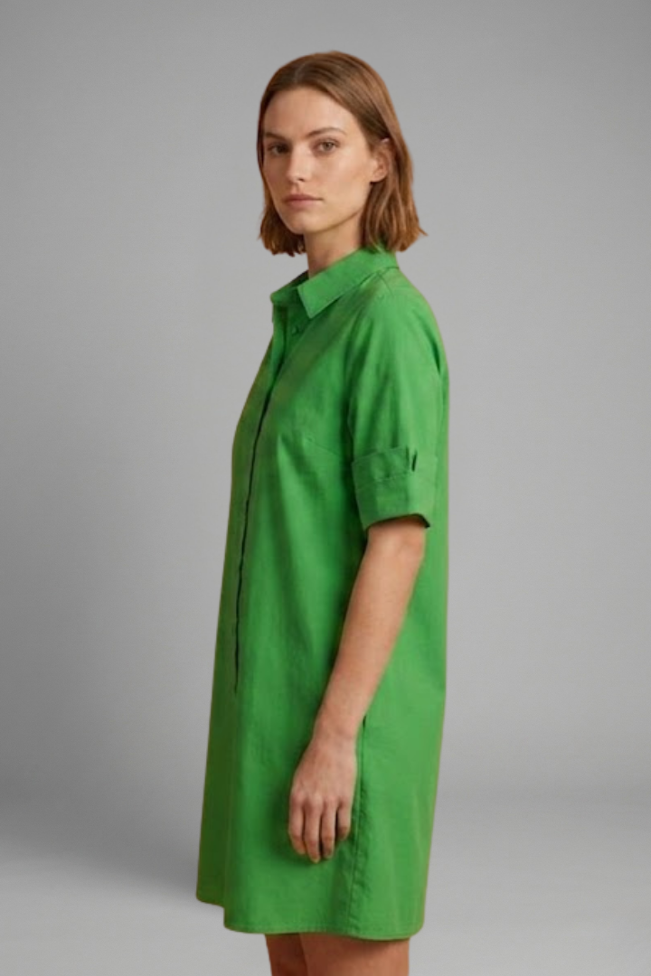 Women’s shirt dress with collared neckline, button-down closure, 3/4 sleeves, and A-line silhouette for everyday styling.