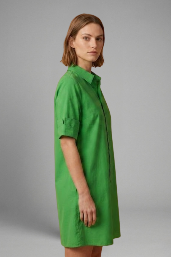 Women’s shirt dress with collared neckline, button-down closure, 3/4 sleeves, and A-line silhouette for everyday styling.