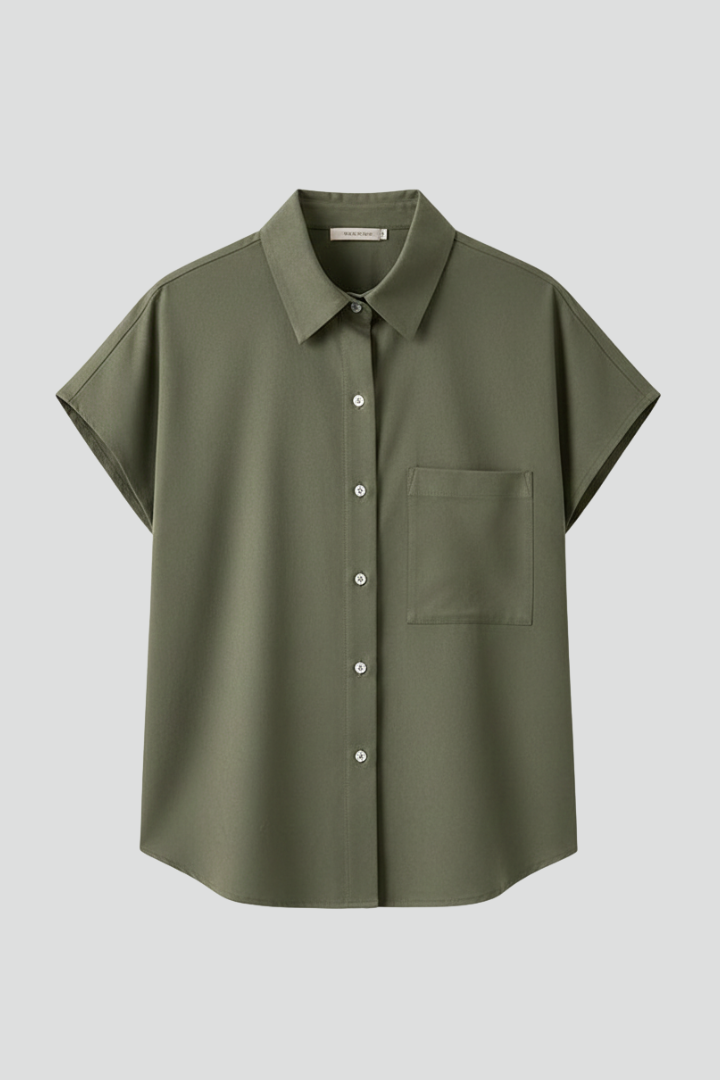 Women’s short sleeve shirt with pointed collar, button front, chest pocket, and straight hem for casual everyday styling.