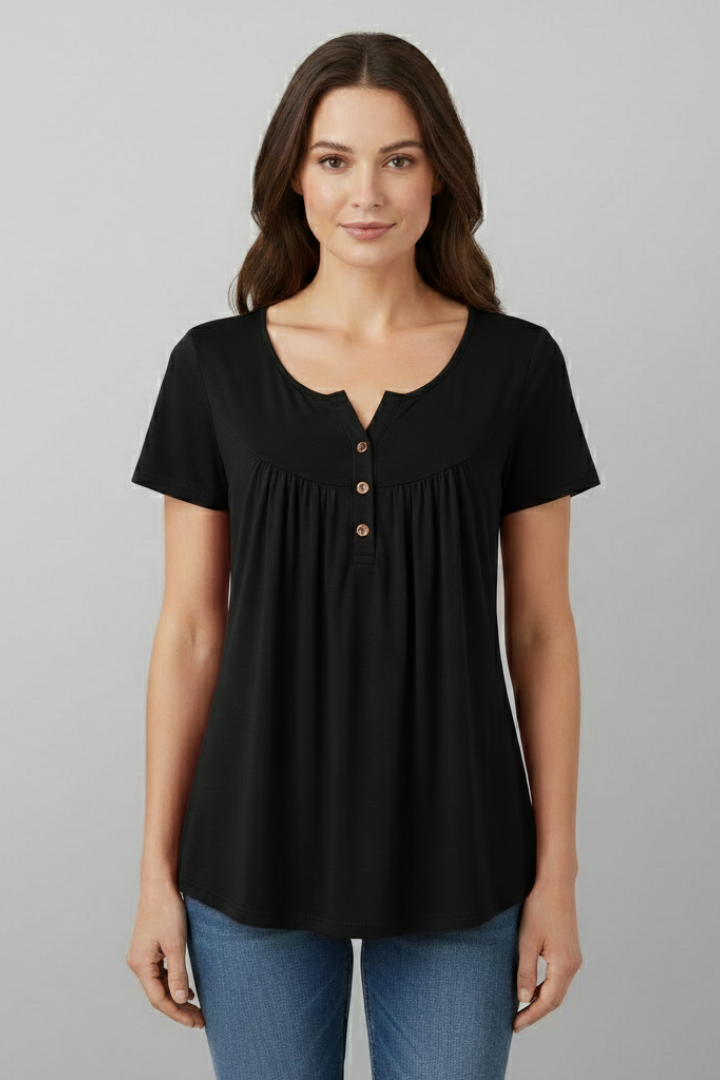 Women’s short sleeve blouse with V-neckline and front button detail, featuring a flared hem and clean finish for everyday wear and office styling.