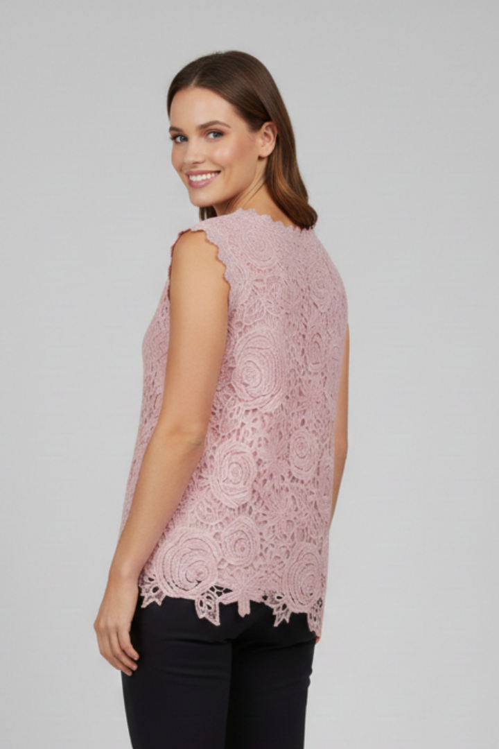 Women’s sleeveless blouse with V-neckline and textured lace-style surface, suitable for summer wear and everyday styling.