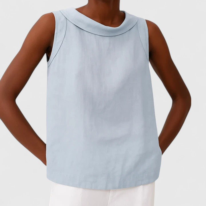 Women’s sleeveless top with a roll collar, draped neckline, and relaxed fit, ideal for office wear, evening outings, and smart-casual styling.