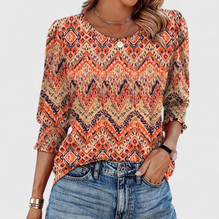 Women’s smocked top with a relaxed fit and lightweight design, ideal for casual outings, vacations, and everyday styling.