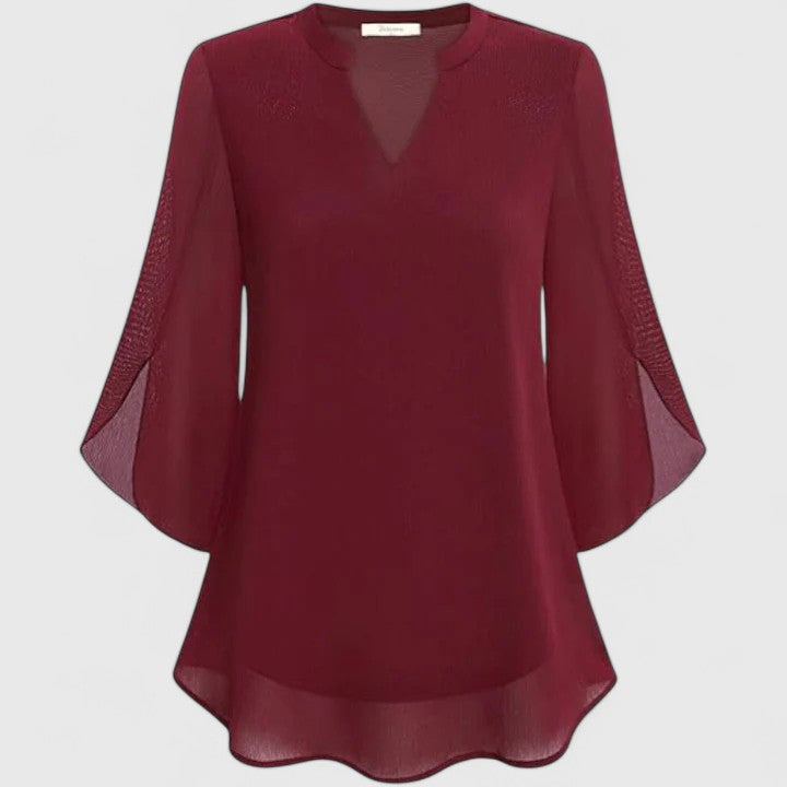 Women’s sophisticated blouse with relaxed fit and elegant silhouette, ideal for office wear, dinners, and casual everyday styling.
