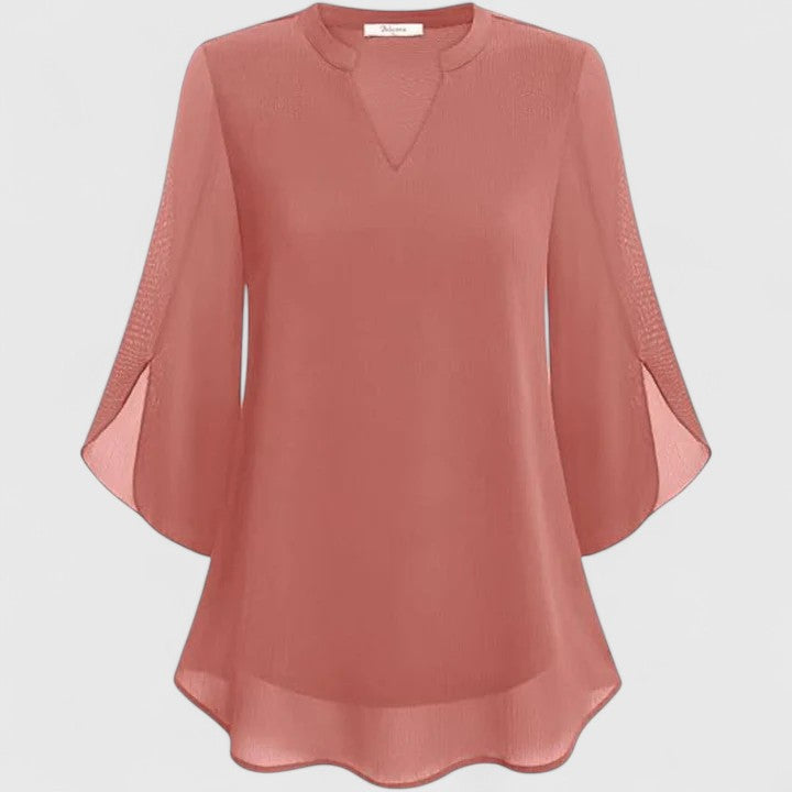 Women’s sophisticated blouse with relaxed fit and elegant silhouette, ideal for office wear, dinners, and casual everyday styling.