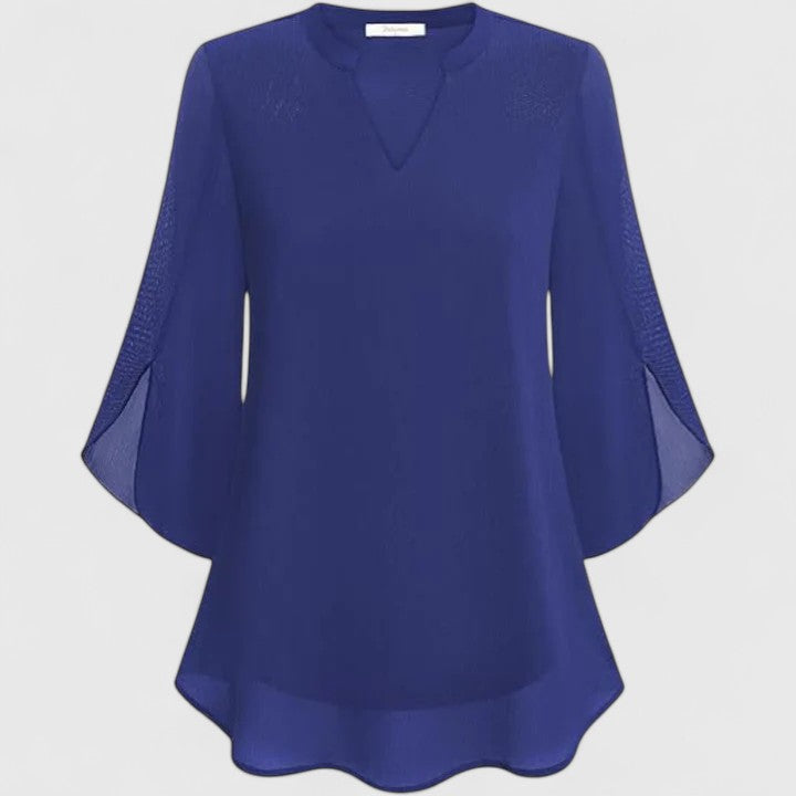 Women’s sophisticated blouse with relaxed fit and elegant silhouette, ideal for office wear, dinners, and casual everyday styling.