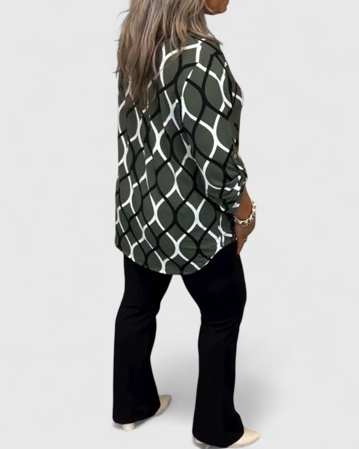 Women’s sophisticated blouse with elegant detailing and a relaxed fit, suitable for office outfits, casual wear, and smart occasions.